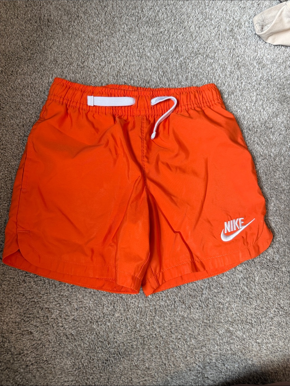 Nike Orange Kids Athletic Shorts with White Swoosh